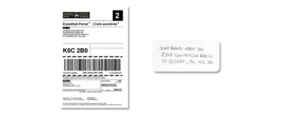 A printer shipping label with address information.