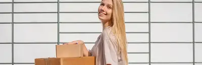A girl carrying the shipping box