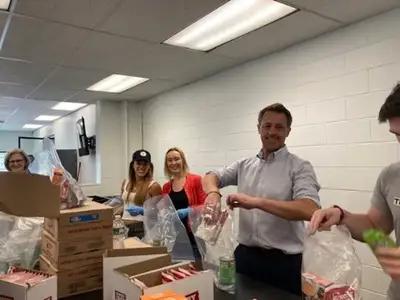 People at office packing foods